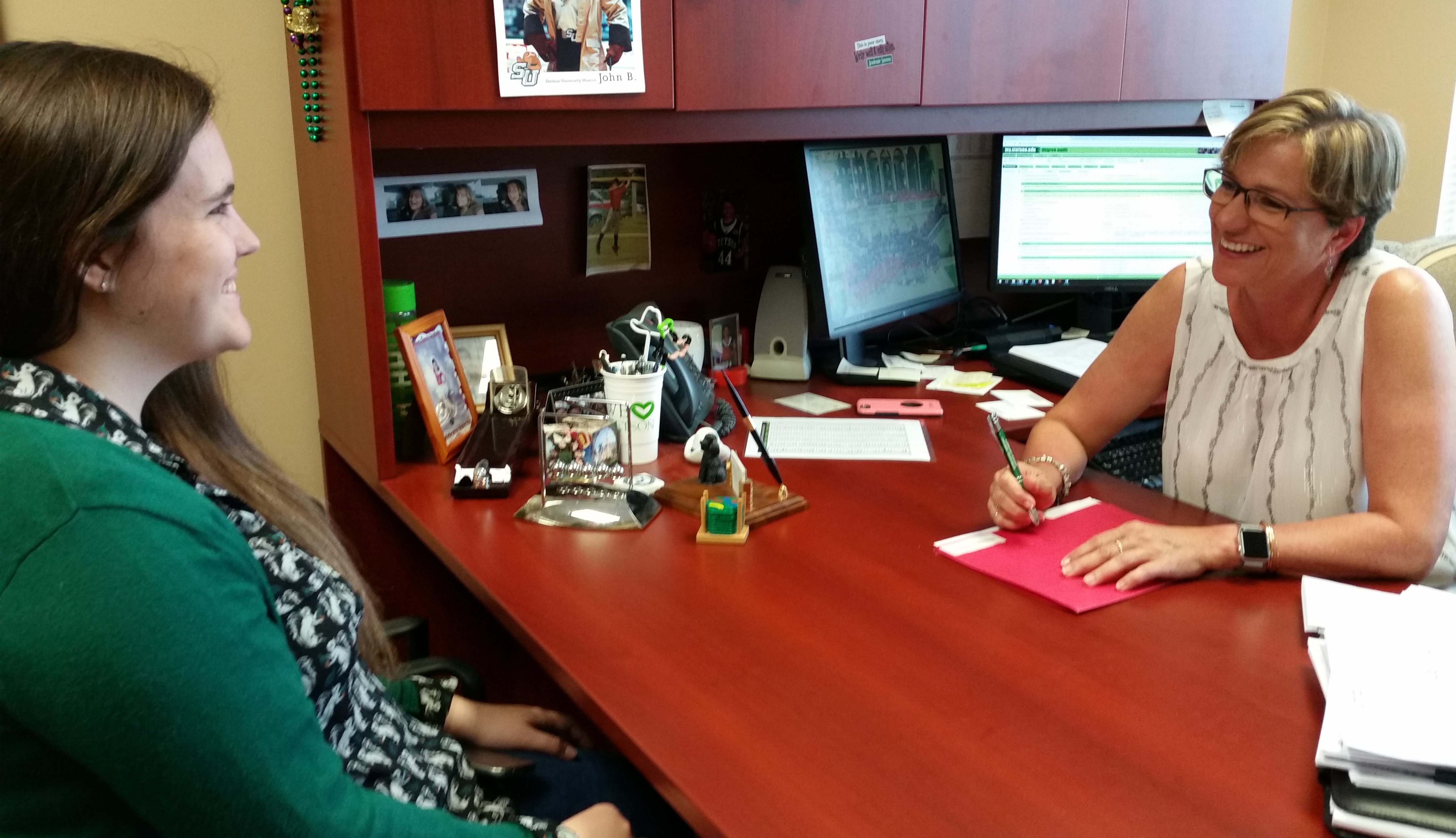 A faculty Advisor having an advising meeting with a student