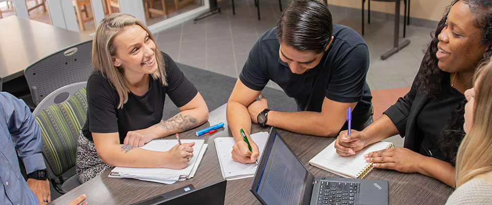 graduate students working in a group