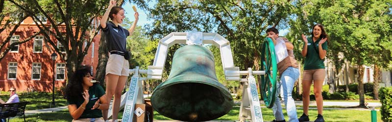 student ringing bell after choosing stetson
