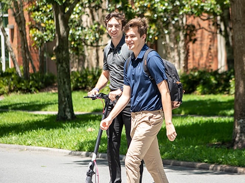 students walking through campus