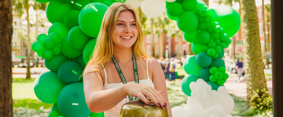 student ringing bell after choosing stetson