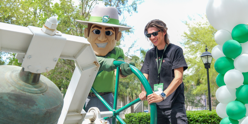 student ringing bell after choosing stetson