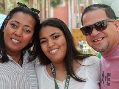 Parents hugging student