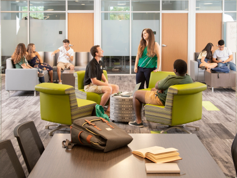 students talking in the Carlton Union Building