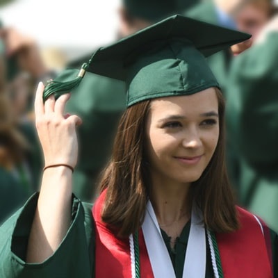 Student walking for graduation