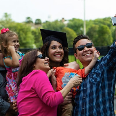 Hatter graduation selfie with family