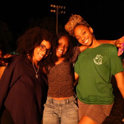 stetson students taking pictures at the bonfire event