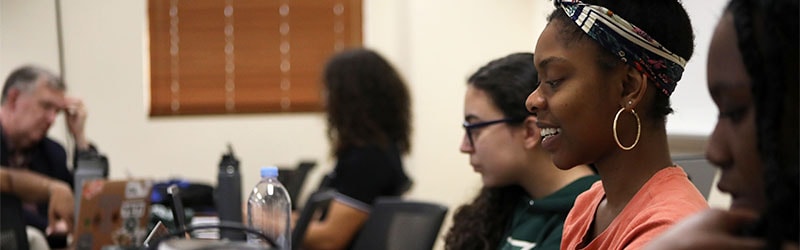 students during class smiling