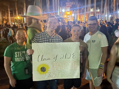 four excited students from LSU