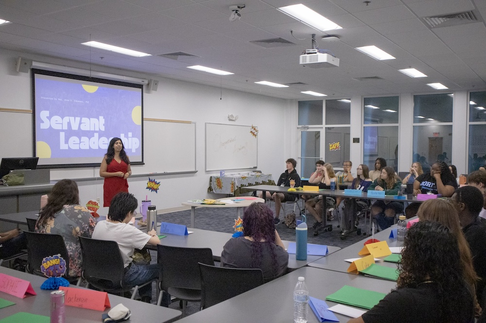 Changemakers Academy 2025 students doing a group activity with Keynote Speaker, Anna Eskamani