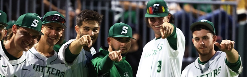 baseball team in uniform pointing at you