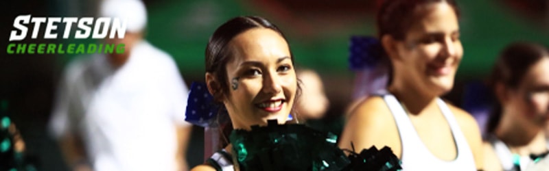 Stetson Cheerleading team smiling during cheer