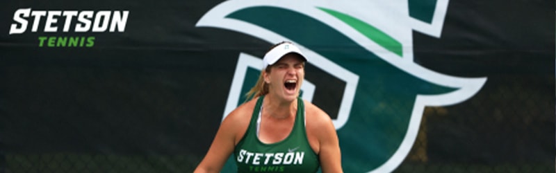 student yelling with passion during a Women's Tennis tournament