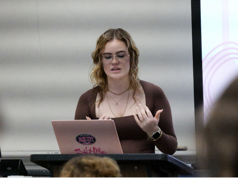 student presenting a powerpoint