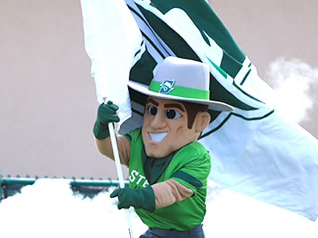 John B mascot running with flag at sporting event