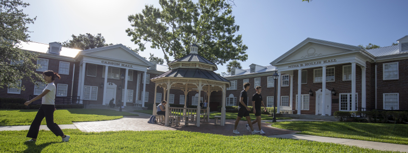 students outside walking on camopus 