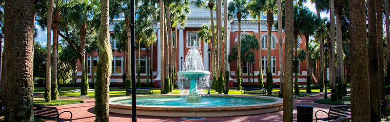 The Holler fountain in the Palm Court with Sampson Hall in the background.