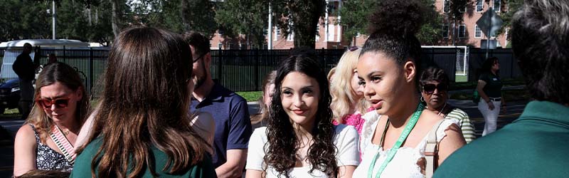 students talking with stetson staff outside