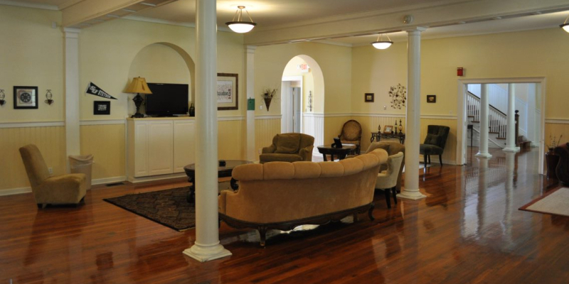 Chaudoin Hall's lounge area with TV pre renovation