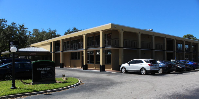 The brown concrete exterior of University Hall