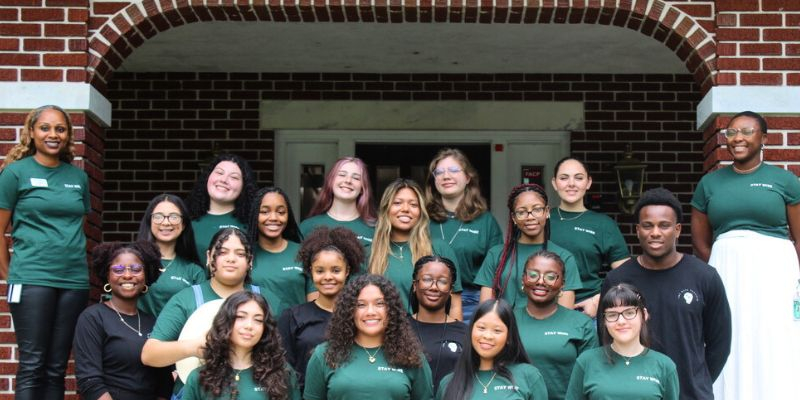 wise cohort in front of the cross cultural center
