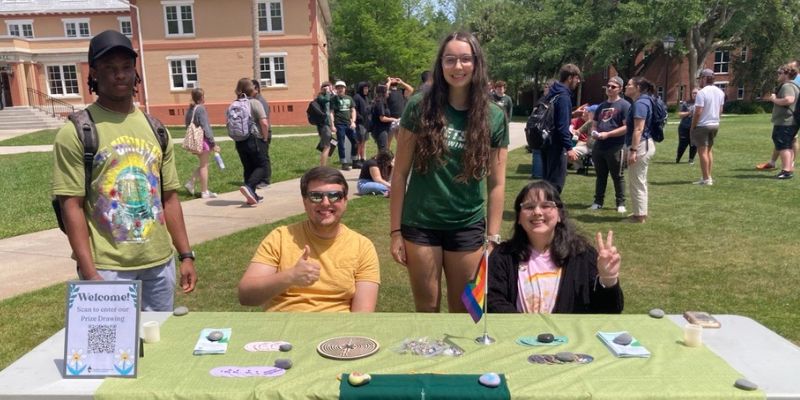 students exploring organizations on campus on tableling event