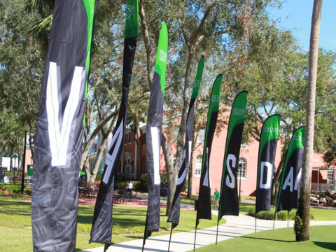 Flags hang that all have the letters in 