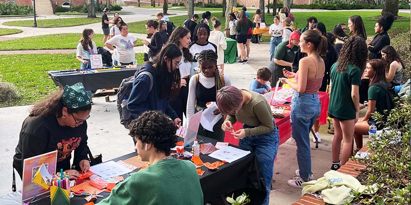 students exploring organizations on campus on tableling event