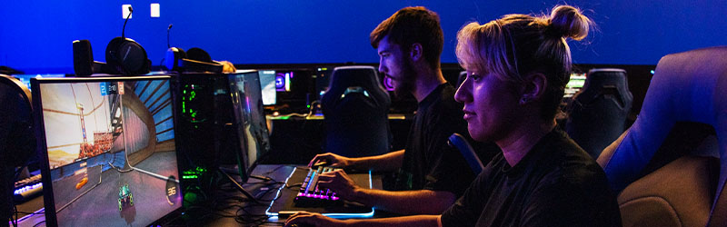 two student splaying together on their computers