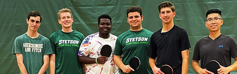 club table tennis group of students posing together