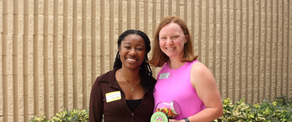 student and fronk scholars director reciving award
