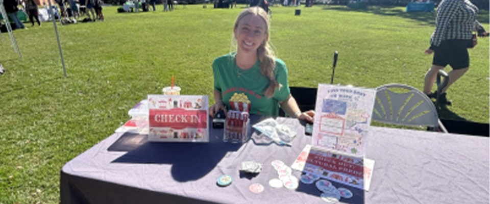 well team student on table event outside