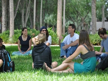 Terry Farrell lecturing in an outdoor setting