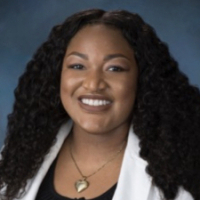 faculty member Allanah Roberts-Headley smiling
