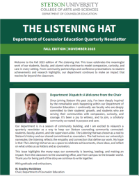 student looking at laptop online