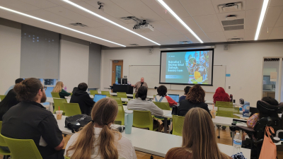 classroom of students watching Dr. Remley speak