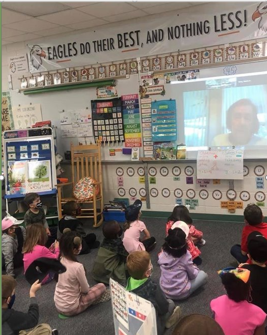 Stetson faculty reading to students during the one-book, one-school project