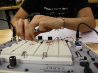 Student working with electronics