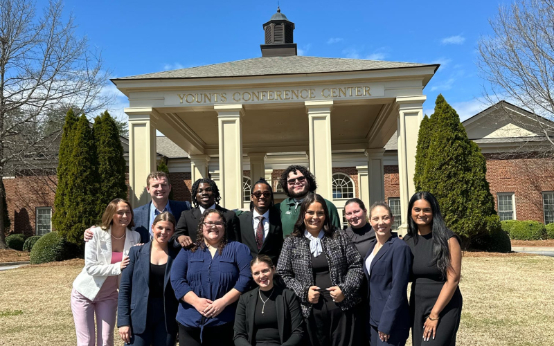 group of students from mock trial in front of younts conference center building