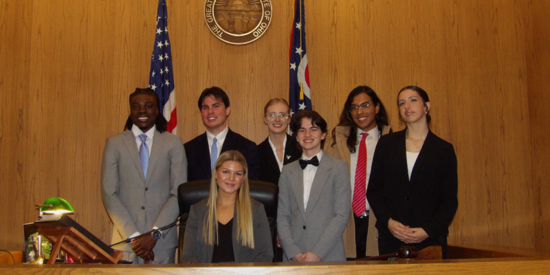 group of students from mock trial in front of younts conference center building