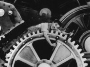 Man on gigantic gears