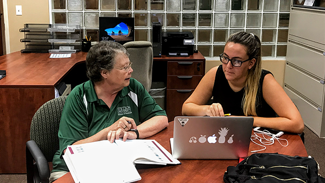 Bonnie Holloway working with student