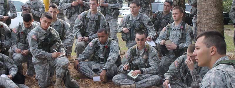 Students in uniform on meeting outdoors
