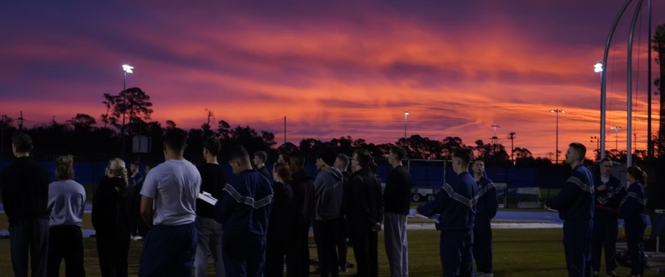 cadets standing in the sunrise