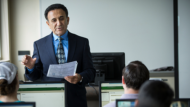 Professor Amiri teaching in computer lab