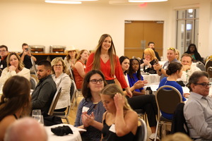 event attendees in chairs