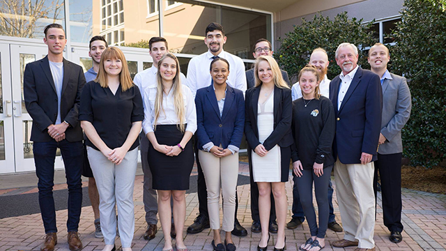 Prince Entrepreneurial Leaders pose in front of the Lynn Business Center