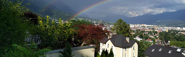 rainbow over the city of Innsbruck