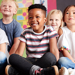 children listening in a classroom