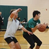 Students playing basketball intramurals